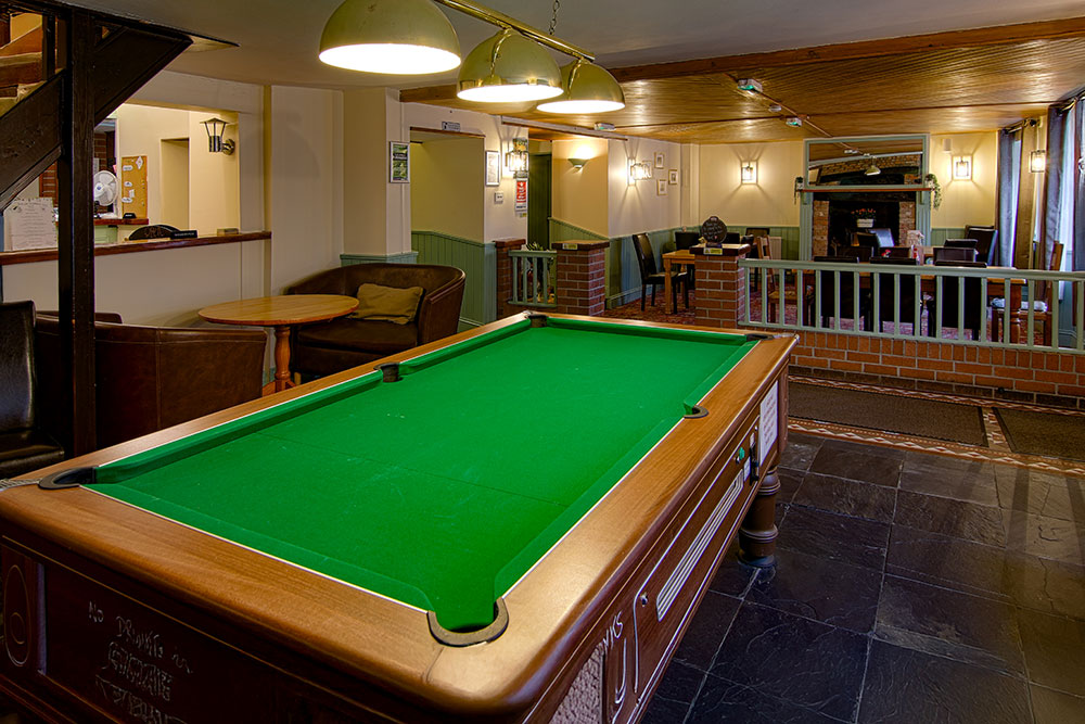 Games room looking through to the lounge area